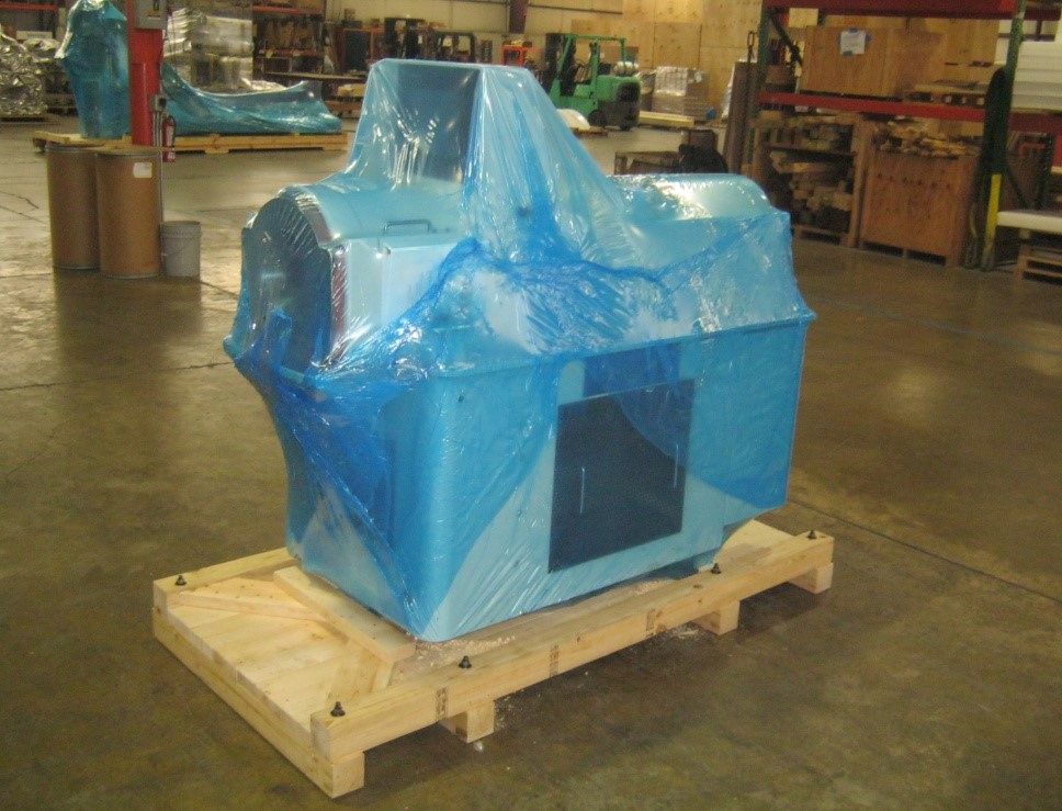 Industrial machinery being packaged for shipment to our customer in South Africa.